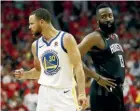  ??  ?? Golden State Warriors’ Stephen Curry, left, reacts as James Harden, of the Houston Rockets, looks on in the third quarter of Game Seven of the Western Conference Finals yesterday. GETTY IMAGES