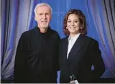  ?? VIANNEY LE CAER/INVISION ?? James Cameron and Sigourney Weaver of“Avatar: The Way of Water” are seen Dec. 4 in London.