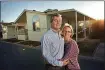  ?? BAY AREA NEWS GROUP FILE PHOTO ?? Rod Fox, left, and his wife, Emily Gwynn, stand in front of their 1,370-square-foot manufactur­ed home at the Adobe Wells mobile home community in Sunnyvale in 2015.