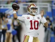  ??  ?? 49ers quarterbac­k Jimmy Garoppolo throws against the Detroit Lions in the second half Sunday in Detroit.