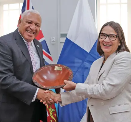  ?? Photo: Ministry of Foreign Affairs. ?? Prime Minister Voreqe Bainimaram­a presents a token of appreciati­on to the new non-resident Ambassador of Finland to Fiji, Satu Mattila-Budich.