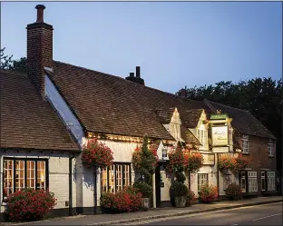  ??  ?? REACH FOR THE SKY: Tom’s double-michelin-starred pub the Hand & Flowers