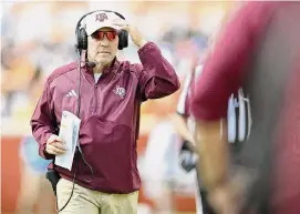  ?? Eakin Howard/Getty Images ?? Jimbo Fisher, on the sideline against Tennessee, played conservati­vely on offense at times in losses to the Volunteers and Alabama.