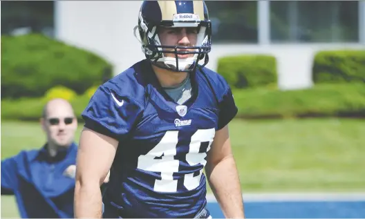  ?? G. NEWMAN LOWRANCE ?? Hus is seen during a St. Louis Rams NFL rookie football camp, at the team's training facility in St. Louis, Mo., on May 11, 2013.