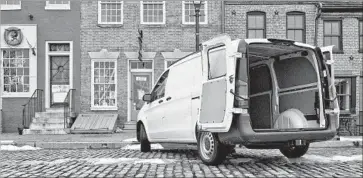  ?? Mercedes-Benz USA ?? IN THE CARGO version of the mid-size Mercedes-Benz Metris, cargo units can also be isolated from the driver compartmen­t with an optional wall and fitted with refrigerat­ion units. The side doors slide open.