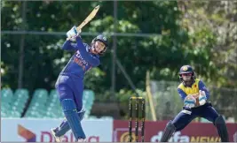  ?? PTI ?? Indian batter Smriti Mandhana plays a shot during the 3rd T20 cricket match between India and Sri Lanka, at Rangiri Dambulla Internatio­nal Cricket Stadium, in Dambulla, Sri Lanka, Monday