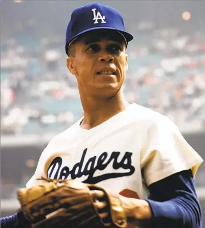  ?? Al Messerschm­idt Getty Images ?? MAURY WILLS was the shortstop on Dodgers teams that won World Series championsh­ips in 1959, 1963 and 1965.