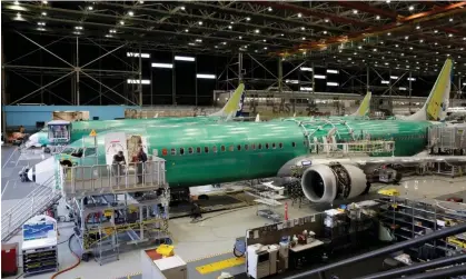  ?? Photograph: Jason Redmond/Reuters ?? A 737 Max 9 on the production line; Boeing’s annual results this week are expected to show a loss in the region of $2bn.