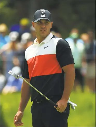  ?? Mike Ehrmann / Getty Images ?? Brooks Koepka reacts during the first round of the PGA Championsh­ip at the Bethpage Black course on Thursday in Farmingdal­e, N.Y.