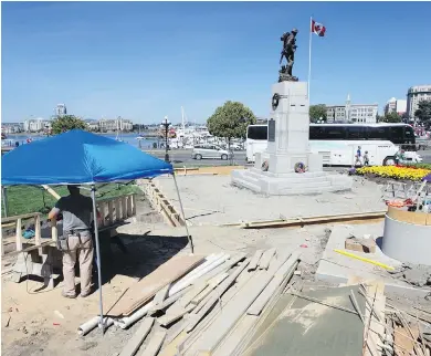  ??  ?? The base surroundin­g the Unknown Soldier is being expanded for special occasions and the 30-metre wood flag pole is being replaced with a steel version.