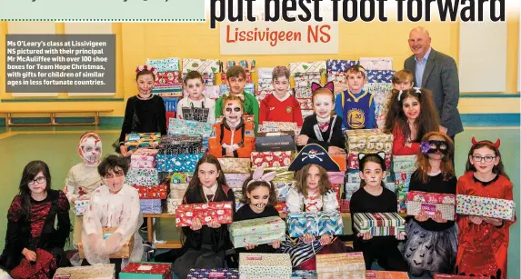 ??  ?? Ms O’Leary’s class at Lissivigee­n NS pictured with their principal Mr McAuliffee with over 100 shoe boxes for Team Hope Christmas, with gifts for children of similar ages in less fortunate countries.