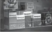  ?? Michael M. Santiago/getty Images/tns ?? Packs of Newport cigarettes are seen on a shelf in a grocery store in the Flatbush neighborho­od in the Brooklyn borough of New York City. On Thursday, the Food and Drug Administra­tion proposed a ban on menthol cigarettes and flavored cigars.