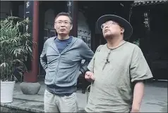  ?? PHOTOS PROVIDED TO CHINA DAILY ?? Above right: Writer Mai Jia (left) leads critic Shi Hang on a visit to the house where he spent his childhood in Hangzhou, Zhejiang province.