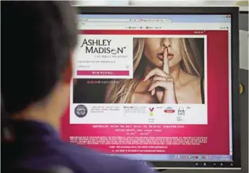  ??  ?? SEOUL: June 10, 2015 file photo shows Ashley Madison’s Korean web site on a computer screen in Seoul. — AP