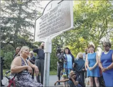  ?? Paul Buckowski / Times Union archive ?? Beverly Bardequez, foreground, president of the Rapp Road Historical Associatio­n, addresses those gathered for the unveiling of a plaque during the Rapp Road community’s 60th Family Reunion Weekend in 2017.