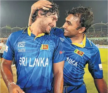  ??  ?? FRIENDS & FRENEMIES: Kumar Sangakkara and Mahela Jayawarden­e epitomised sporting bromance, while Teddy Sheringham & Andy Cole were totally faking it in this photo
