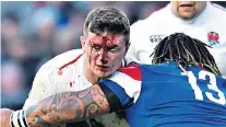  ??  ?? Hit men: Tom Curry needed stitches to a head wound and Mako Vunipola (bottom) went off early with an ankle injury