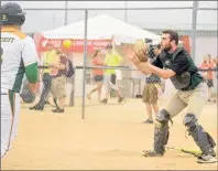  ??  ?? Team P.E.I. catcher Sam Walsh, of Elliotvale, takes a throw at the plate for a force out against Saskatchew­an Wednesday at the Canada Games in Winnipeg.