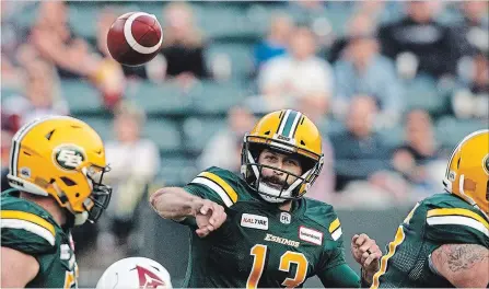  ?? JASON FRANSON THE CANADIAN PRESS ?? Edmonton quarterbac­k Mike Reilly, above, and Winnipeg running back Andrew Harris are both in contention for CFL’s top player award.