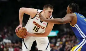  ?? ?? Denver’s Nikola Jokić finished with 26 points despite going 4 of 12 from the floor on Monday against the Warriors. Photograph: Ron Chenoy/USA Today Sports