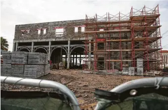  ?? Michael Ciaglo / Staff photograph­er ?? Post-Ike Galveston looks different than when the storm rolled through 10 years ago. Old landmarks, like the Flagship Hotel, have been demolished, and infrastruc­ture improvemen­ts have been made.