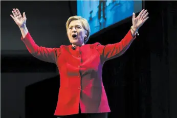  ?? CP PHOTO ?? Hillary Clinton gestures to an audience in Toronto while promoting her new book, What Happened, on Thursday.