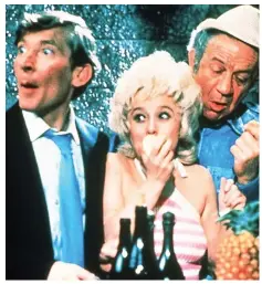  ??  ?? Screen icon: Barbara Windsor with Kenneth Williams, left, and Sid James in 1972 movie Carry On Abroad