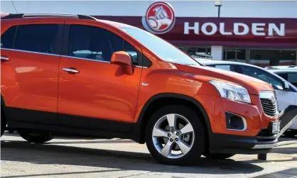  ?? Photograph: William West/AFP via Getty Images ?? ‘Why did the economy grow in June? That jump in household consumptio­n mainly.’ File photo of a Holden car yard in Melbourne.