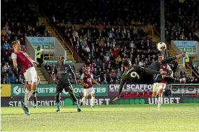  ?? GETTY IMAGES ?? Roberto Firmino of Liverpool attempts an overhead kick during the 3-0 win over Burnley yesterday.