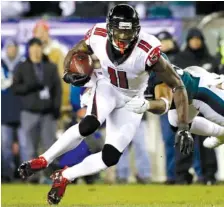  ?? AP PHOTO/MATT ROURKE, FILE ?? Atlanta Falcons wide receiver Julio Jones runs Jan. 13 during a divisional playoff game against the Eagles. A person familiar with the discussion­s said the Falcons won’t renegotiat­e Jones’ contract this season.