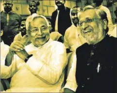  ?? AP ?? Bihar chief minister Nitish Kumar, left, and deputy chief minister Sushil Kumar Modi after the oathtaking ceremony at Raj Bhawan, Patna, July 27. That both sides were playing to a script that had been written well in advance is obvious