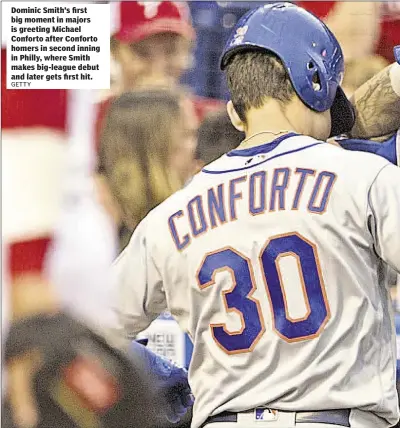  ??  ?? Dominic Smith’s first big moment in majors is greeting Michael Conforto after Conforto homers in second inning in Philly, where Smith makes big-league debut and later gets first hit.