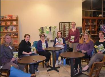  ?? PHOTO BY LAURA CATALANO ?? Members of the Towne Book Center’s non-fiction book club hold their most recent title. Members include (l to r) Lisa Frikker-Gruss, Amanda Stucke, Mary Ann Piecara, Emma Majewski, Towne Book Center General Manager Sarah Danforth, Janet Fitzpatric­k and Lenore Tichnell.