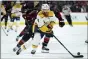  ?? GERRY BROOME — THE ASSOCIATED PRESS FILE ?? In this May 17, 2021, file photo, Nashville Predators defenseman Ryan Ellis (4) skates against the Carolina Hurricanes during the second period in Game 1 of an NHL hockey Stanley Cup first-round playoff series in Raleigh, N.C. Nashville’s revamping of the roster continued Saturday with the Predators trading Ellis to the Philadelph­ia Flyers for defenseman Philippe Myers and forward Nolan Patrick.