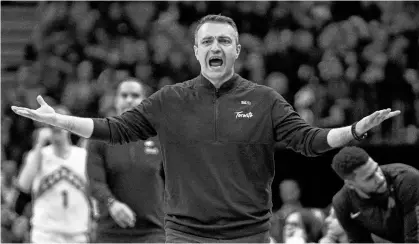  ?? DAN HAMILTON ■ USA TODAY SPORTS ?? Toronto Raptors head coach Darko Rajakovic reacts to an official’s call during a recent NBA game.