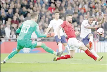  ?? — Reuters photo ?? England’s Raheem Sterling scores their third goal during Euro 2020 Qualifier match against Czech Republic at Wembley Stadium.