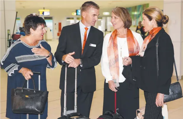  ?? Picture: ANNA ROGERS ?? THE TEAM: Members of the Cairns TNQ Convoy, Tourism Tropical North Queensland CEO Pip Close, Advance Cairns CEO Nick Trompf, Cairns Chamber of Commerce CEO Debbie Anne Bender and Tourism Tropical North Queensland chairwoman Wendy Morris at Cairns Airport as they depart for Canberra.