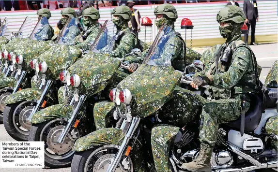  ?? CHIANG YING-YING ?? Members of the Taiwan Special Forces during National Day celebratio­ns in Taipei, Taiwan