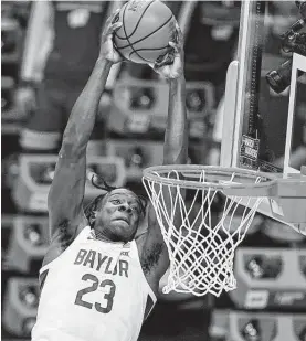  ?? Michael Conroy / Associated Press ?? Dealing with Baylor forward Jonathan Tchamwa Tchatchoua is one of the many things the Cougars will have to do well to reach the national title game.