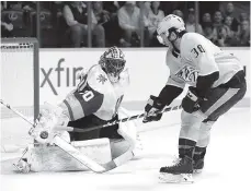  ?? AP PHOTO/MARK HUMPHREY ?? Nashville right wing Ryan Hartman scores his first goal of Tuesday’s game against the Vegas Golden Knights in Nashville.