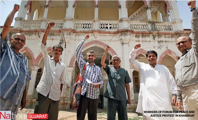  ??  ?? WORKERS OFFORUM FOR PEACE AND
JUSTICE PROTEST IN KHAMBHAT