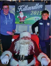  ??  ?? Ben and Charlie Cremin with Santa Claus