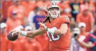  ?? Richard Shiro / Associated Press ?? Trevor Lawrence and Clemson held on to the No. 1. spot in the The Associated Press college football poll after a 66-point rout of Georgia Tech on Saturday.