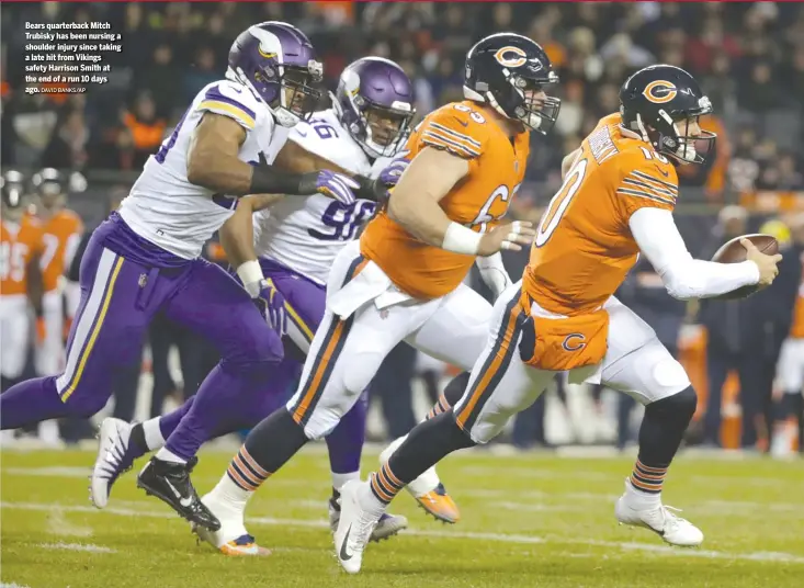  ?? DAVID BANKS/AP ?? Bears quarterbac­k Mitch Trubisky has been nursing a shoulder injury since taking a late hit from Vikings safety Harrison Smith at the end of a run 10 days ago.