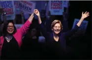  ?? DAVID ZALUBOWSKI—ASSOCIATED PRESS ?? Democratic presidenti­al candidate Sen. Elizabeth Warren, D-Mass., right, acknowledg­es the crowd with Colorado State Sen. Julie Gonzalez, D-Denver, before speaking at a campaign rally Sunday, Feb. 23, 2020, in Denver.