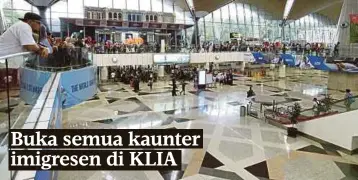  ??  ?? SUASANA di Pusat Pemeriksaa­n Imigresen, KLIA berjalan seperti biasa.