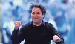  ?? MATHEW IMAGING ?? Gustavo Dudamel hosts “In Concert at the Hollywood Bowl,” culled from a decade of performanc­es.
