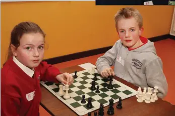  ??  ?? Siofra Ní Fhionnalla­in, Enniscorth­y Gaelscoil, and Vincent Higgins, Kilanerin NS.