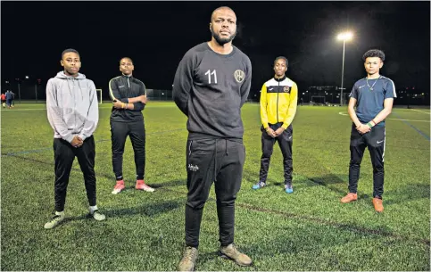  ??  ?? Making a difference: Bobby Kasanga, founder of Hackney Wick FC, with some of his players; the first team are semi-profession­al and there are 250 junior members