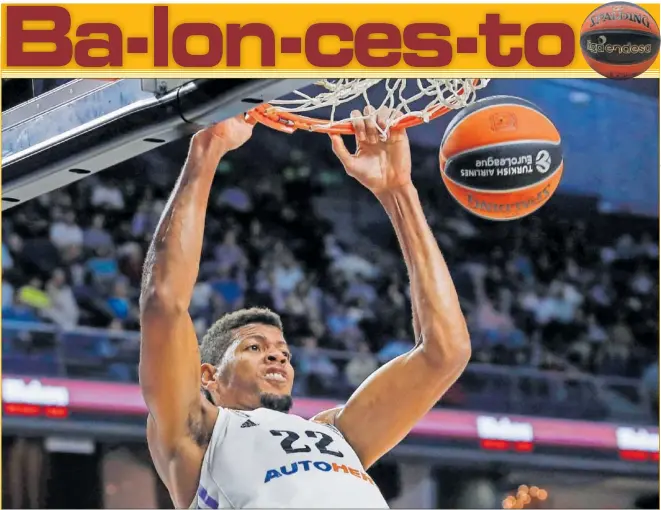  ?? ?? Edy Tavares, muy superior a los pívots del Partizán, se cuelga del aro con fuerza. El interior del Madrid acabó con 17 puntos y 8 rebotes.